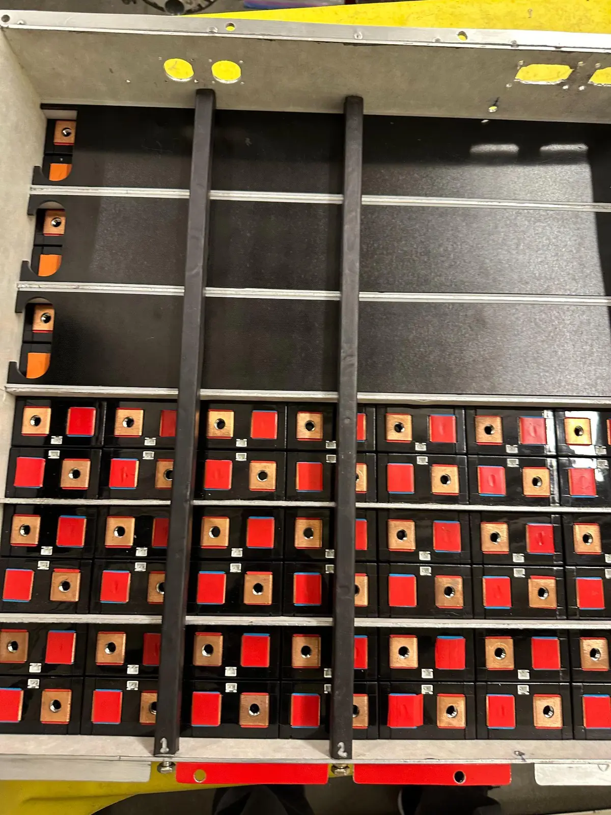 Battery packs arranged into accumulator segments with copper busbars