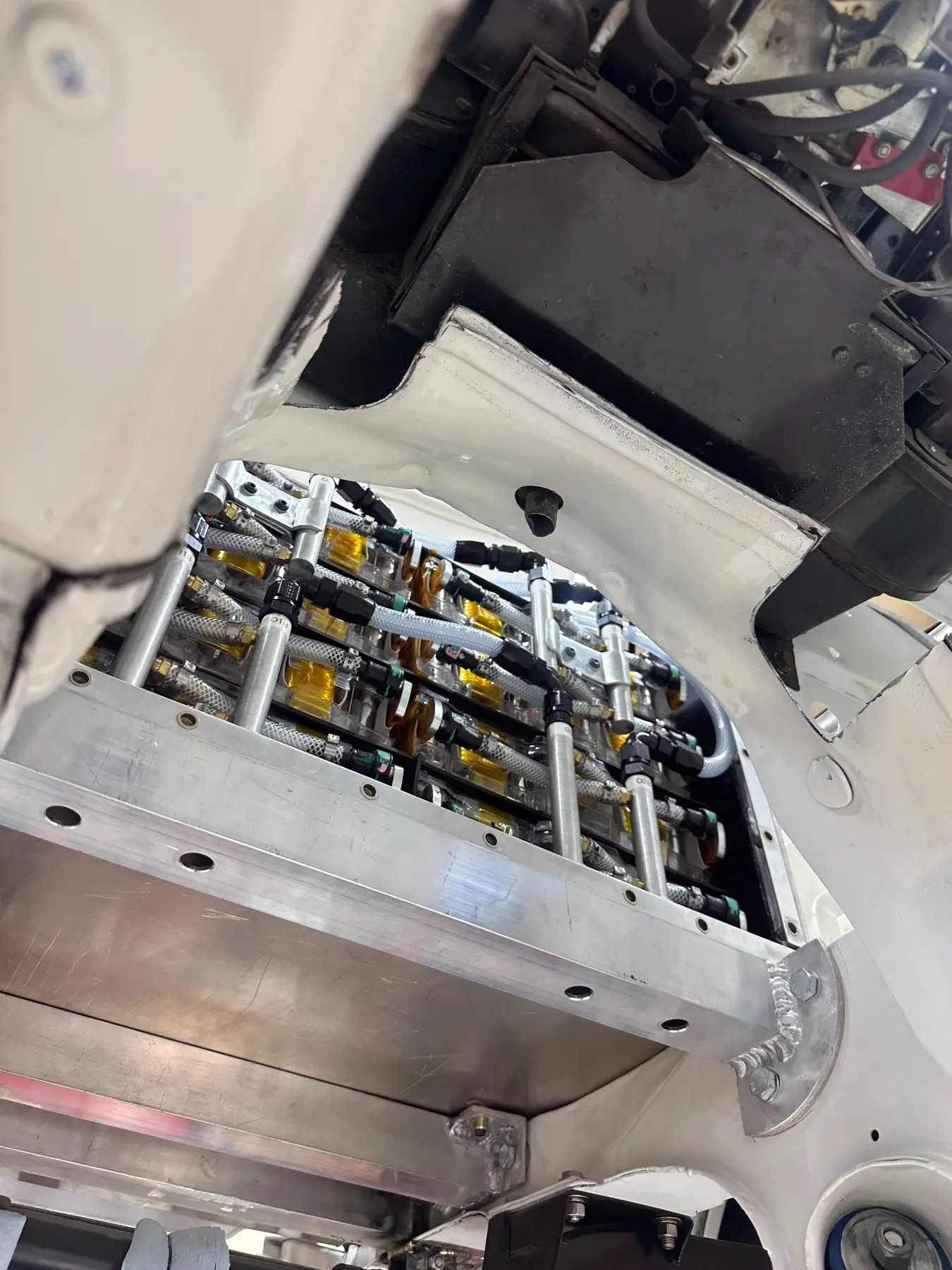 Array of Tesla Model S battery modules installed in the aluminum enclosure